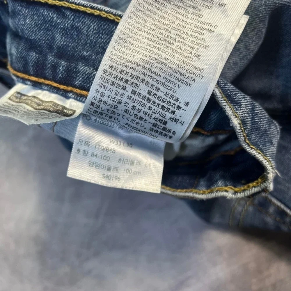 Levi's 502 Mid Wash Faded Denim Jeans